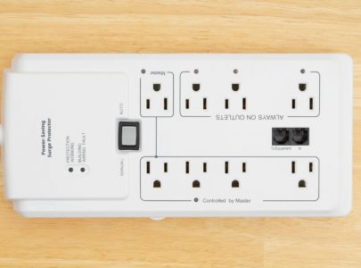 If you have invested in a small surge protector, one of the models that looks like a little power strip which you can plug appliances into, you might be wondering just how well it can protect your devices, electronics, and appliances. You probably got that surge protector so you can rest assured that power surges won’t fry that brand new TV. In most cases, a surge protector will work just fine. However, a small power surge that originates from the power company, the power grid, or from within your own home is a bit different than a lightning strike. So, does a surge protector protect against lightning? Surge Protectors and Lightning Strikes A very important thing to know is how much or how strong of a power surge your average surge protector can handle. Once again, here we are talking about the power strip-type surge protectors. These tend to be rated at about 15 amps, with some going a few amps higher than that. This should be enough for most basic power surges, but what about a lightning strike? A direct lightning strike, on average, will come in at anywhere from 5,000 to 20,000 amps. However, extremely heavy lightning strikes have been known to register as high as a whopping 200,000 amps, so, you can do the math here. In a worst case scenario, a surge protector rated for 15 amps, when hit with 200,000 amps of electricity, will still leave a massive 199,985 amps for your electronics to deal with. It doesn’t take much to figure out that the result here is a fried and probably melted television. A surge protector might be able to deal with smaller lightning strikes that hit many miles away from your home and hit the power grid. The reason they may be able to handle this is because by the time that lightning strike gets to your home, a lot of the amperage has already dissipated, but even then, an average surge protector may still not do the trick. There are much better in-home surge protectors that feature disconnects which totally shut the power off. These can help add a bit more protection, but then again, a lightning bolt that traveled several miles probably won’t be deterred by a couple inches of space which that disconnect provides. Therefore, simply put, no, a surge protector won’t do a single thing to stop that lightning strike from deep frying your television and anything else you have plugged in. Protecting Your Electronics From Lightning Although your basic surge protector won’t do anything to stop the tremendous amperage which a lightning bolt produces, there are some steps you can take to help prevent your electronics from winding up in the trash can after a lightning storm. Service Entry Surge Protectors If you are still looking to get a surge protector to protect against massive energy surges, such as from lightning strikes, your best bet is to go for a service entry surge protector. These are installed before the circuit breaker in your home, thus protecting your whole home. Now, these are not overly expensive to buy, but can be very costly to install. These kinds of surge protectors can handle many more amps than an in-home or power strip-type surge protector, potentially up to hundreds or even thousands of amps depending on the specific unit in question. That said, this still won’t be enough to stop a direct lightning strike. A Full Lightning Protection System A full-fledged lightning protection system, one that consists of lightning rods, cables, and grounding, are your best bet to protect your electronics against full lightning strikes. These can divert virtually all of the amps which would otherwise hit your home head on. Now, the best lightning protection systems can divert nearly 100% of the amps from your home, which should be enough to save your valuable electronics. However, these must be top-quality lightning protection systems, or else even these cannot guarantee total protection. Unplug it All Quite honestly, the best way to stop a lightning strike from frying your television is simply by unplugging it. Whatever it may be, in the vast majority of direct lighting strikes, there is nothing that can fully protect your home and its electronics 100%. The only way to really stop the current from ruining your valuables is to unplug them from any and all outlets. Conclusion The bottom line is that no, surge protectors will not protect against a lightning strike. Lightning is too powerful for even the best surge protectors to handle. Unfortunately, this is the way it is. Mother nature can be cruel, so while you can be prepared, being 100% protected in this sense is virtually impossible.